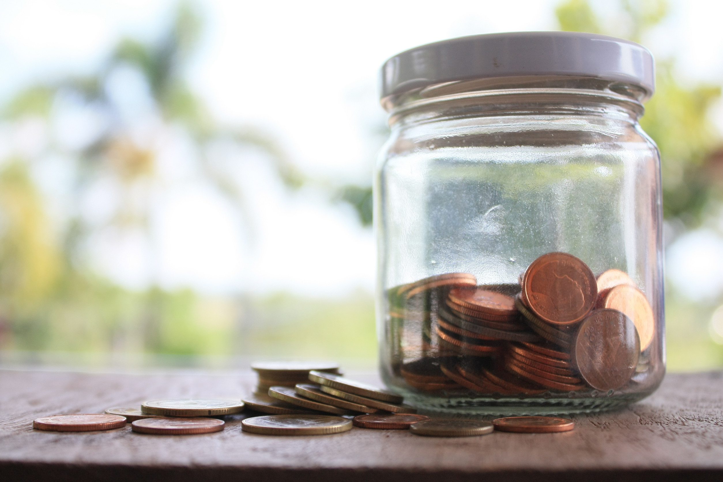 Dollar bills and coins representing energy savings