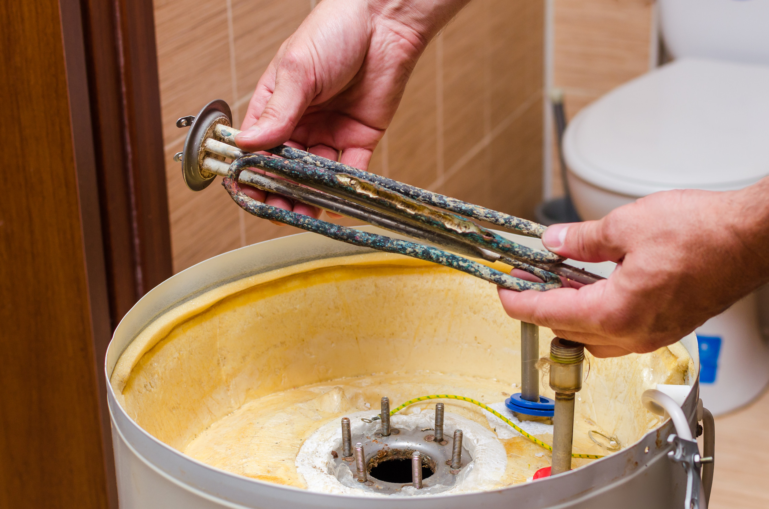 Water heater showing signs of age and corrosion